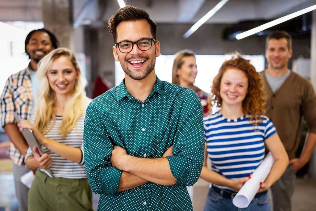 A group of architects smiling thanks to their new business policy