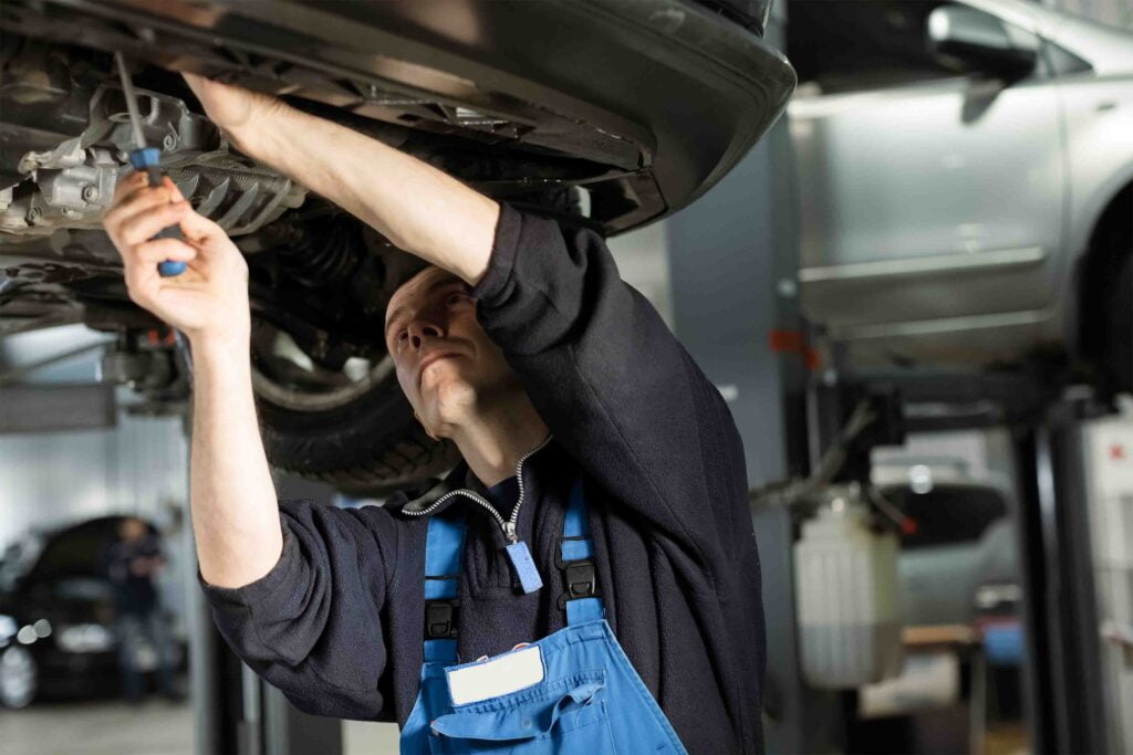 Business motor vehicle being worked on