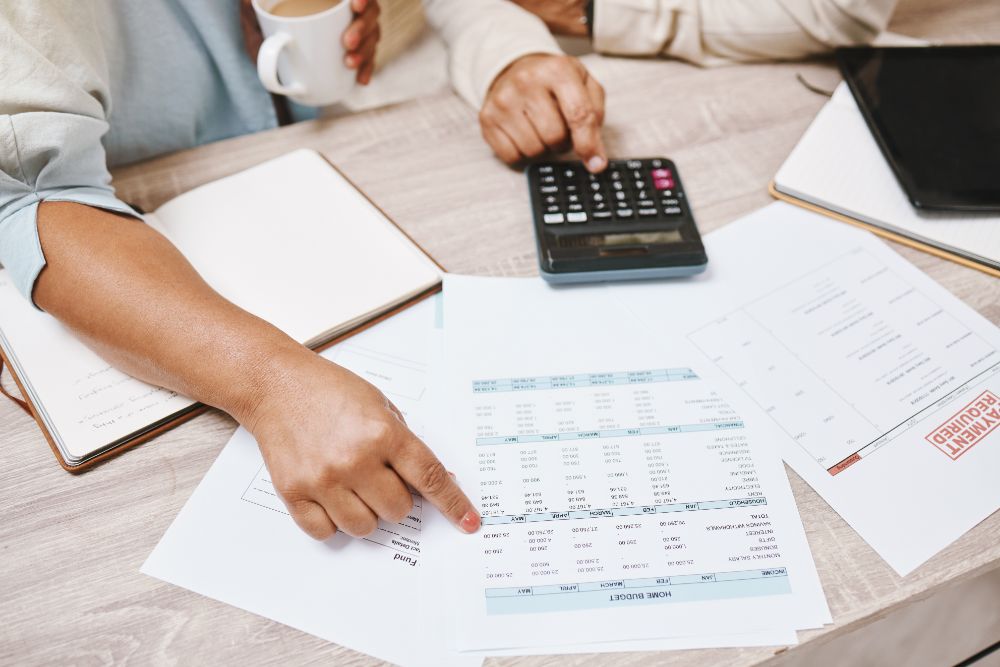 two women evaluating finances for insurance policy